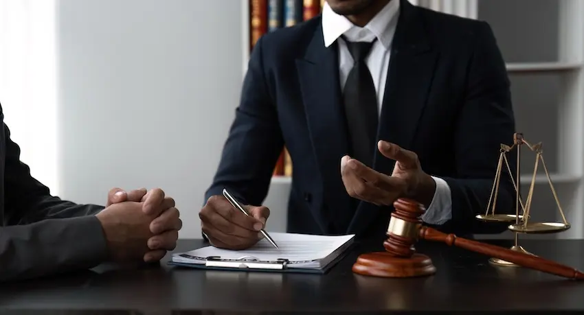 Whiplash After a Car Accident: What It Really Means for Your Health and Your Case Personal injury lawyer meeting with a car accident victim to discuss a whiplash injury claim